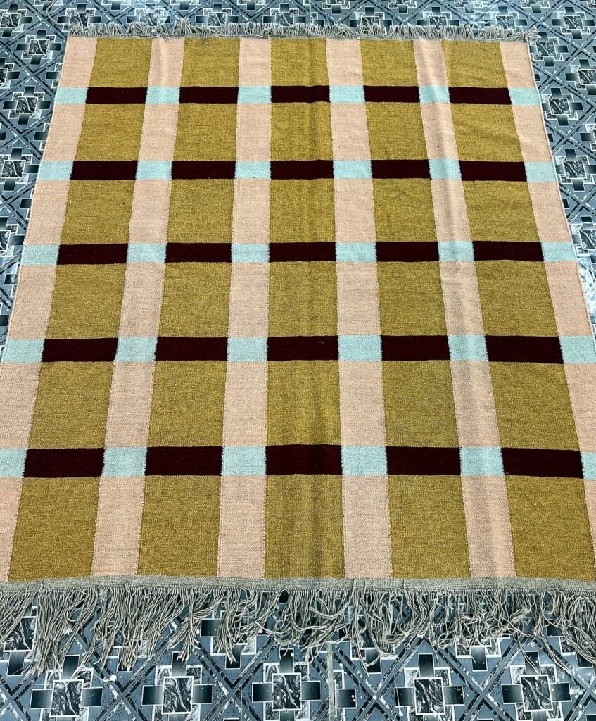 Handwoven mustard and beige windowpane check kilim rug | The Rugs Curator — Pakistani Premium Rugs