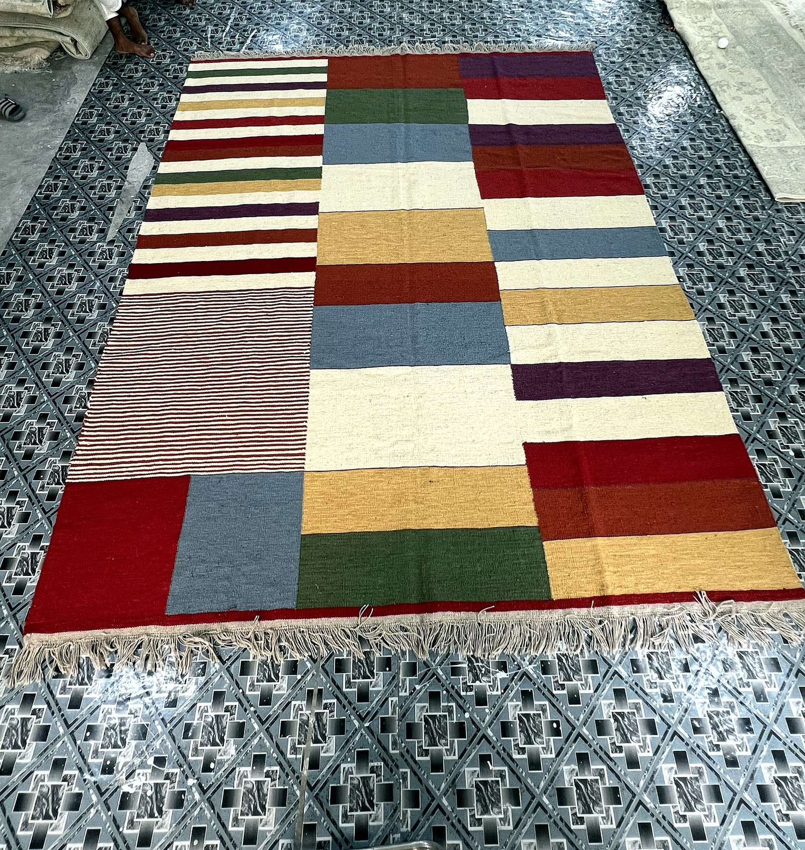 Angled full-length view of the handwoven multicolor prism patchwork kilim rug | The Rugs Curator — Pakistani Premium Rugs