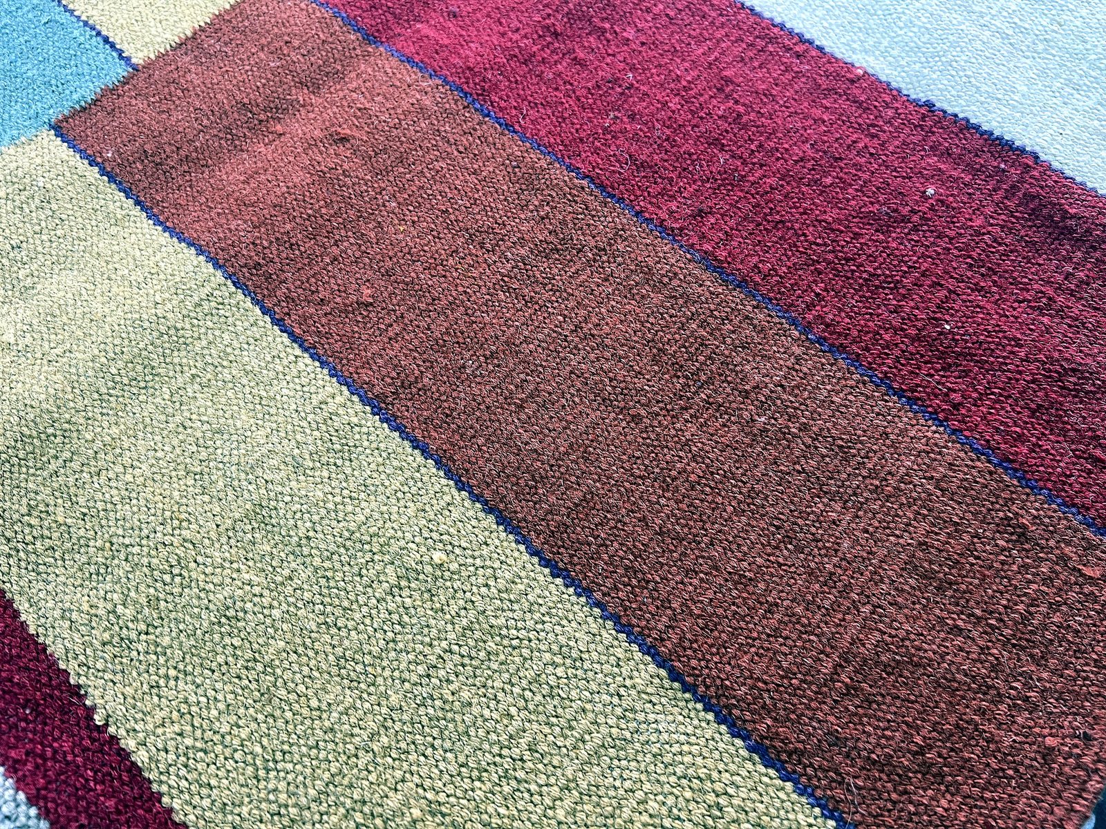 Close-up of the striped panel and weave detail on the sunset patchwork kilim rug | The Rugs Curator — Pakistani Premium Rugs